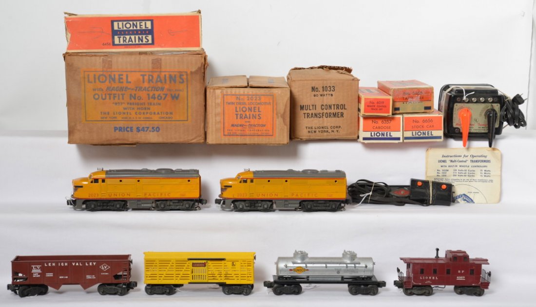 Boxed Lionel Outfit No. 1467W 027 2023 freight train: Postwar Lionel O gauge Outfit No. 1467W 027 freight train with horn in original boxes. Set is comprised of: No. 2023 Union Pacific twin Alco diesel A units, 6456 LV hopper, 6656 Armour stockcar, 6465