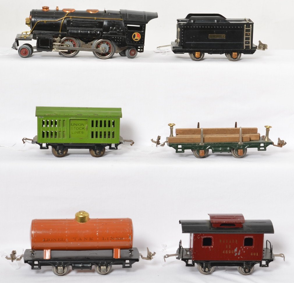 Lionel 259E, tender, 831, 802, 804, 801 freight: Prewar Lionel O gauge 259E steam locomotive and unnumbered tinplate tender, 831 lumber car, 802 stock car, 804 tank, and 801 Wabash Railroad caboose. Trains are very nice and clean C6 area.