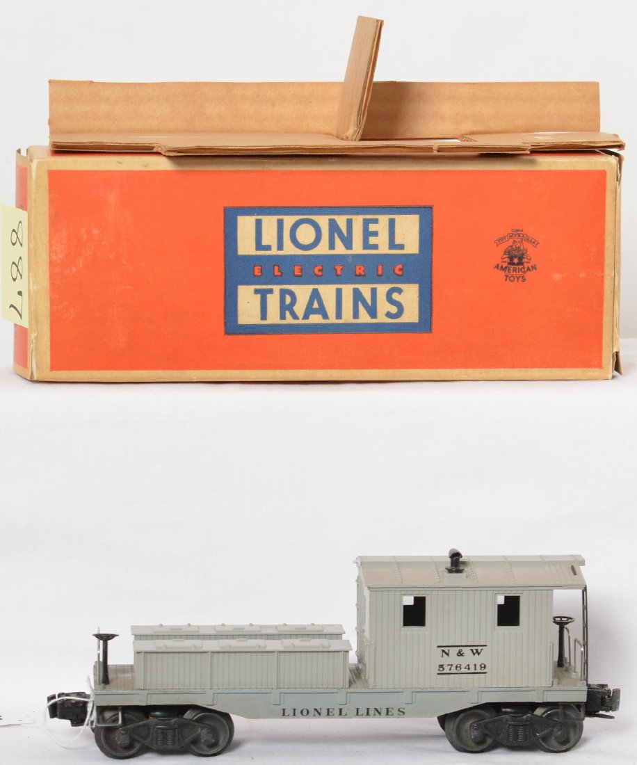 Lionel 6419-100 N&W work caboose in OB w/insert: Postwar Lionel O gauge 6419-100 Norfolk and Western work caboose in original box with insert, unrun C9-10. Box has 1/2 inch tear to flap fold, otherwise C9.
