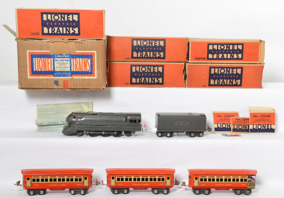 Lionel boxed prewar passenger set 1074W: Lionel prewar O gauge boxed set 1074W with set box and 1668E, 1689W, 1690, 1690 and 1691. Boxes have some wear. Trains are nicer C7.