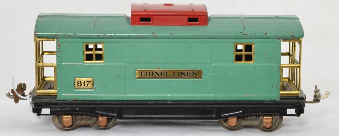 Unusual Lionel 817 all peacock with red cupola caboose: Unusual Lionel prewar O gauge 817 caboose in all peacock with a red cupola. Brass trim with copper journals. C6+.