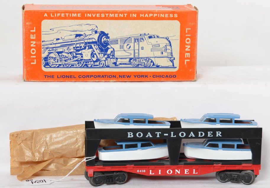 Nice Lionel 6416 boat loader car in OB: Lionel postwar O gauge 6416 boat loader car with original boats. High grade C8+. OB is C7 with minor tape, all flaps intact.