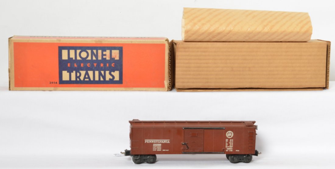 Lionel 2954 semi scale PRR boxcar, OB: Lionel prewar O gauge semi scale 2954 Pennsylvania boxcar, no cracks or warping, C7-8. OB has all flaps, however one of inner flaps is detached. Includes the insert and wrap.