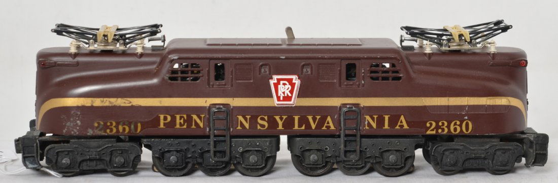 Lionel 2360 dual motor Pennsylvania GG1: Lionel postwar O gauge 2360 dual motor Pennsylvania GG1. This is the version with decal letters and number and a painted stripe. 90% of the engine looks nice C7-8 but it does have some blemish to the