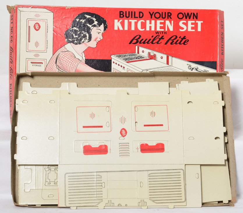 Built-Rite Kitchen Set No. 66 in OB: Built Rite Kitchen Set No. 66 in original box. The box lid and base both have creases and loose corners. The inner contents are all mint and unpunched. This set makes an ice box, stove and sink. These