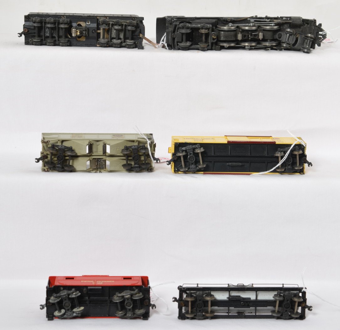 Lionel 001 Hudson, 002W, 0014, 0015, 0016, 0017: Lionel prewar OO gauge 001 full scale three rail Hudson with 002 tender, 0014 boxcar, 0015 tank, 0016 hopper and a 0017 caboose. Engine needs a little cleaning, C6-7. Cars are C7+.