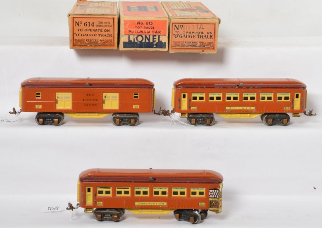 Lionel prewar 613, 614 and 615 terra cotta, OB: Lionel prewar O gauge terra cotta and maroon 615 baggage car, 613 Pullman and 614 observation car. 613 has some light corrosion spots on one side, C6-7 overall. Two boxes are pretty good, the 614 is m