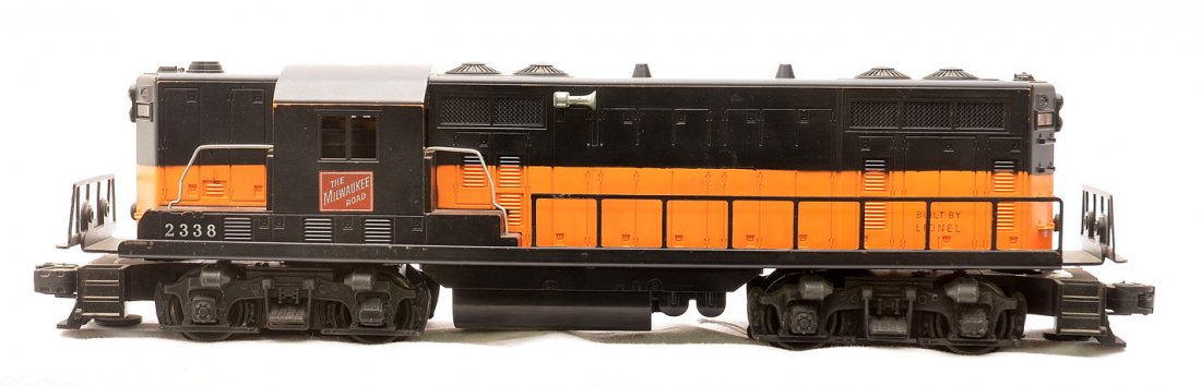 Lionel Postwar 2338 Milwaukee Road GP7 Diesel: Lionel postwar 2338 Milwaukee Road GP7 diesel. There is a large spot of paint missing on the cab roof. Diesel is C6.