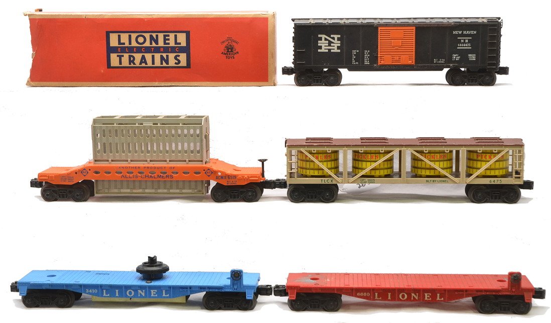 Lionel Freights 6464-425 6475 6519 6660 3410: Lionel postwar freight cars including; 6464-425 New Haven type III boxcar in worn OB, 6475 vat car with two broken steps, 6519 Allis Chalmers car with a broken brake wheel, 6660 boom car missing load 