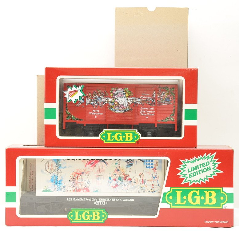 LGB 4085CC MRRC 13th Anniv. 4335S Christmas: LGB G scale 4085CC Limited Edition LGB Model Railroad Club 13th Anniversary flatcar with one container and a 4335S Christmas boxcar with sound both in OBs with outer sleeves. Cars have never been run,
