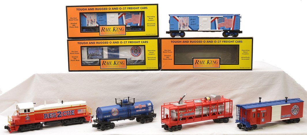 RK by MTH 30-4075-1 Rescue FDNY Train Set: Rail King by MTH 30-4075-1 Rescue 2 FDNY train set with Proto Sound 2.0 including; NW2 switcher, tank car, fire car and a work caboose. The set has no boxes or accessories. Also included are three Rai