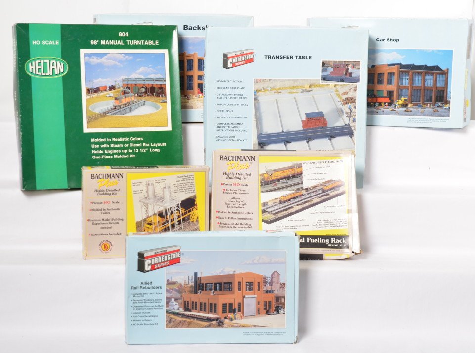 HO railroad service facility kits and transfer table,: Modern HO building kits for railroad maintenance facilities. Includes Bachmann 35114 sand towers and 35112 fuel rack. 804 Heljan turntable. Walthers items include 3040 car shop, 3131 transfer table, 3