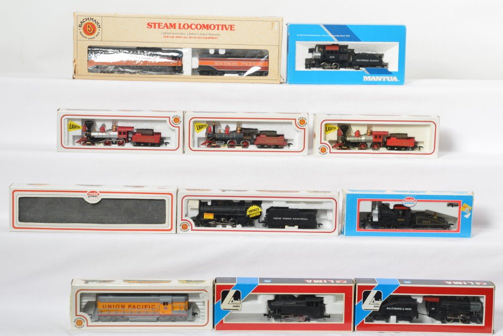 11 HO locomotives IC, Central Pacific, B&O, etc: Eleven modern HO locomotives. Manufactures include Model Power, Bachmann, Lima, Mantua, etc. Locos include Union Pacific GP-18, 6580 Illinois Central 4-6-0, two Jupiter 4-4-0 locos, Union Pacific 119 