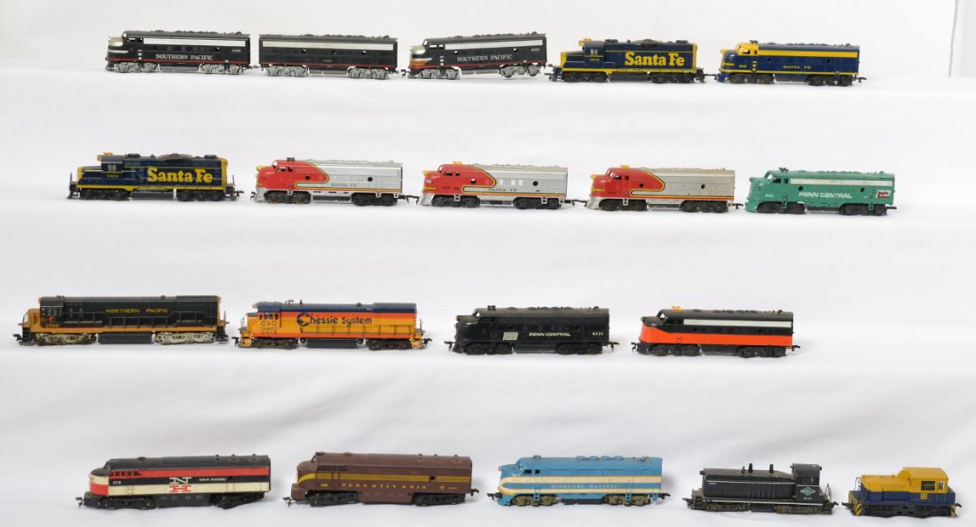 19 HO locomotives Santa Fe, Penn Central, SP, etc: Modern HO diesel locomotives. Nineteen locos road names include Santa Fe, Southern Pacific. Penn Central, and others. Manufactures include Tyco, Mantua, AHM, etc. Trains are C6-7. Sold as is shown in 