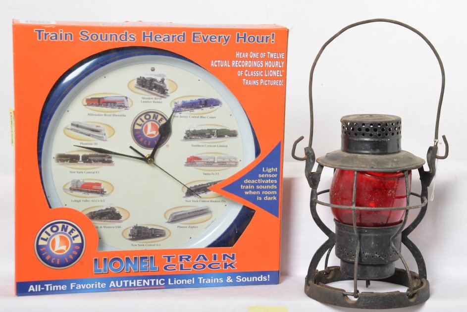 Lionel clock and DIetz B&O lantern: Lionel train clock in OB and Dietz 999 lantern with electrical conversion. Top stamped B&O RR. See photos for best description. Sold as is.