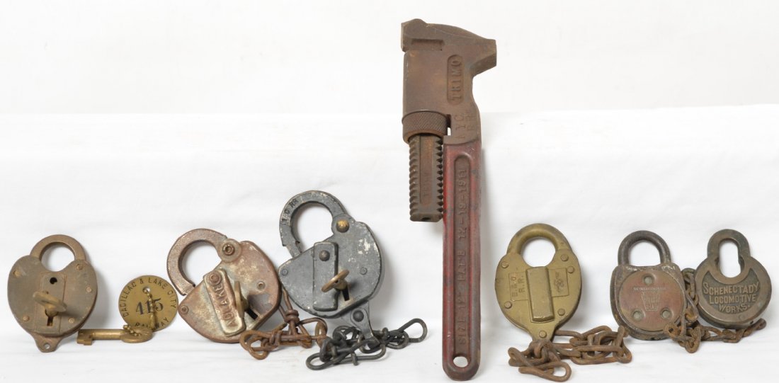 Neat group of railroad locks and tools Schenectady loco: Neat group of Railroadiana locks and tool. Includes pipe wrench with NYC RR stamped in the head, Schenectady Locomotive works lock, Union Pacific CS-21 lock for Roadway & Bridge Department, Pennsylvan