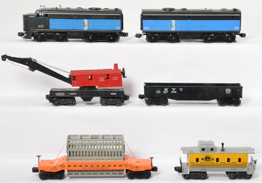 Lionel 217P, 217C, 6062, 6519, 6560, 6657 diesel: Postwar Lionel O gauge 217P and 217C Boston and Maine diesel Alco A and B units, 6062 New York Central gondola, 6519 Allis Chalmers car, 6560 operating work crane, and 6657 Rio Grande caboose, C6 area