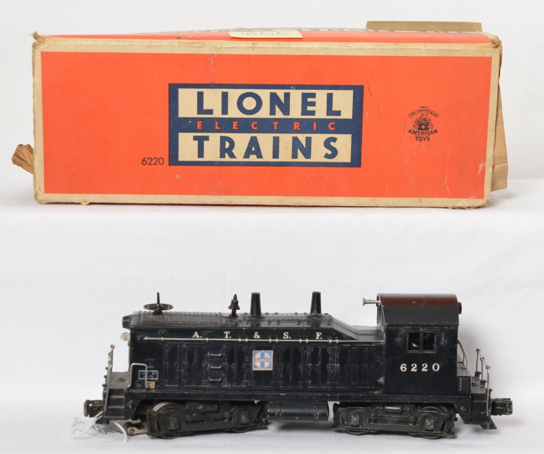 Lionel 6220 A.T.S.F. NW-2 diesel switcher in OB: Postwar Lionel O gauge 6220 A.T.S.F. NW-2 diesel switcher in original box with insert. Train looks C6. Box is missing all flaps.