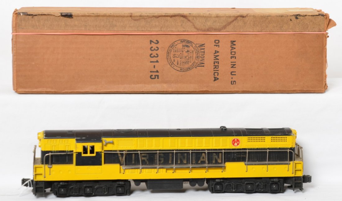 Lionel 2331 Virginian FM Trainmaster diesel in OB: Postwar Lionel O gauge 2331 Virginian Fairbanks Morse Trainmaster diesel locomotive in original box with insert. Loco has hairlines and touchups at both screws, and minor scuffs at window and some cor