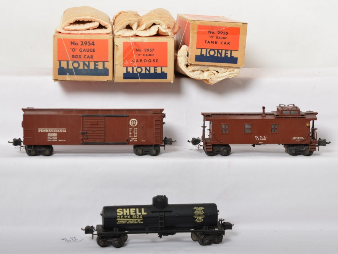 Nice Lionel 2954 PRR, 2955 Shell, 2957 NYC OB: Lionel prewar O gauge semi scale freights including 2954 Pennsylvania boxcar, 2955 Shell tank car and a 2957 New York Central caboose. The tank car is C8-9, caboose C8 and boxcar also looks in that C8