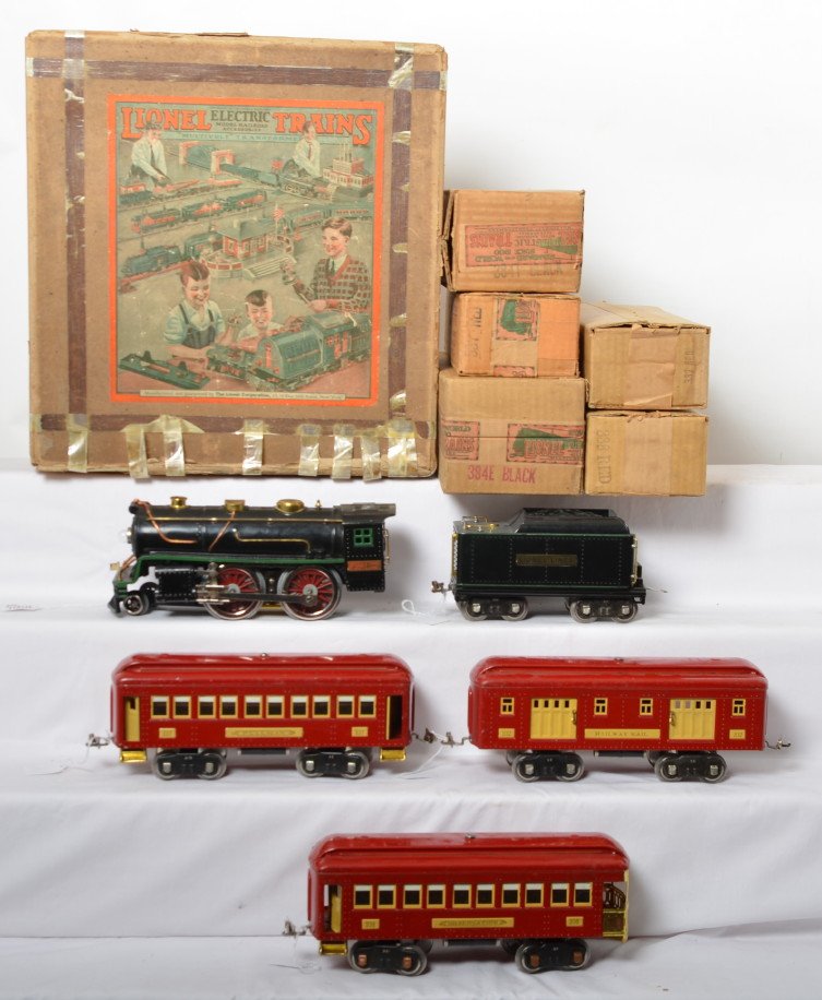 Nice prewar Lionel boxed Special 2 red passenger set: Lionel prewar standard gauge Special 2 boxed set. Set box has some wear. Trains include a 384 steam locomotive, 384 tender and 337, 338 and 332 in red. Trains are nicer C7. Interior boxes are really h