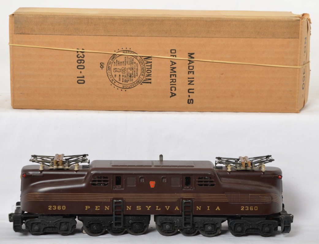 Lionel 2360 5 stripe Tuscan GG1 in OB: Lionel postwar O gauge 2360 5 stripe Tuscan GG1, very nice stripes on both sides, C8. OB is dated 56 2360-10.
