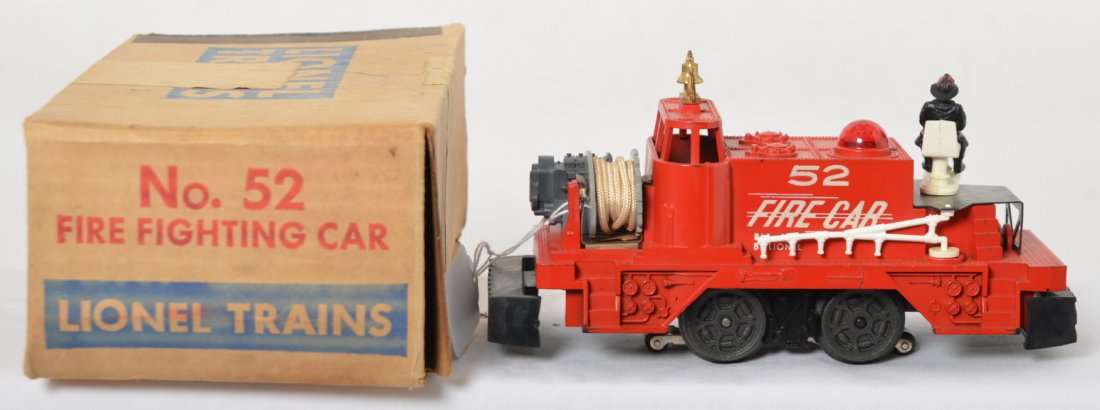 Lionel 52 fire car in OB: Lionel Postwar O gauge operating 52 fire car in OB. Car is C7 with some light paint wear at the edges of the car and a few very small flash rust spots on the platform. OB includes instruction sheet an
