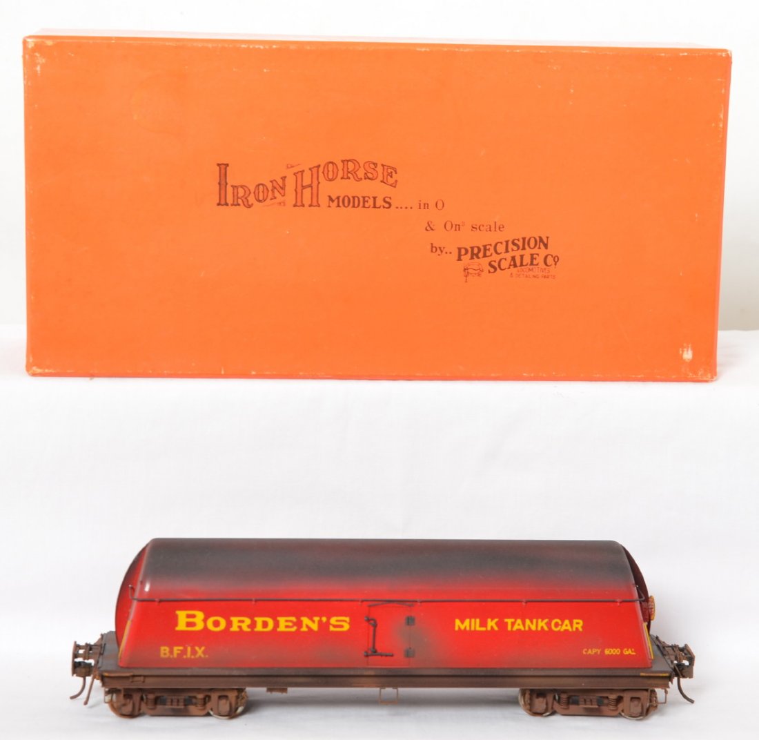 Precision Scale BordenÍs milk tank car weathered: Precision Scale Co. modern two rail brass 16049-1 BordenÍs milk tank car streamlined with end fins. Car was factory painted and then weathered. Car is C8+. OB has some corner wear.