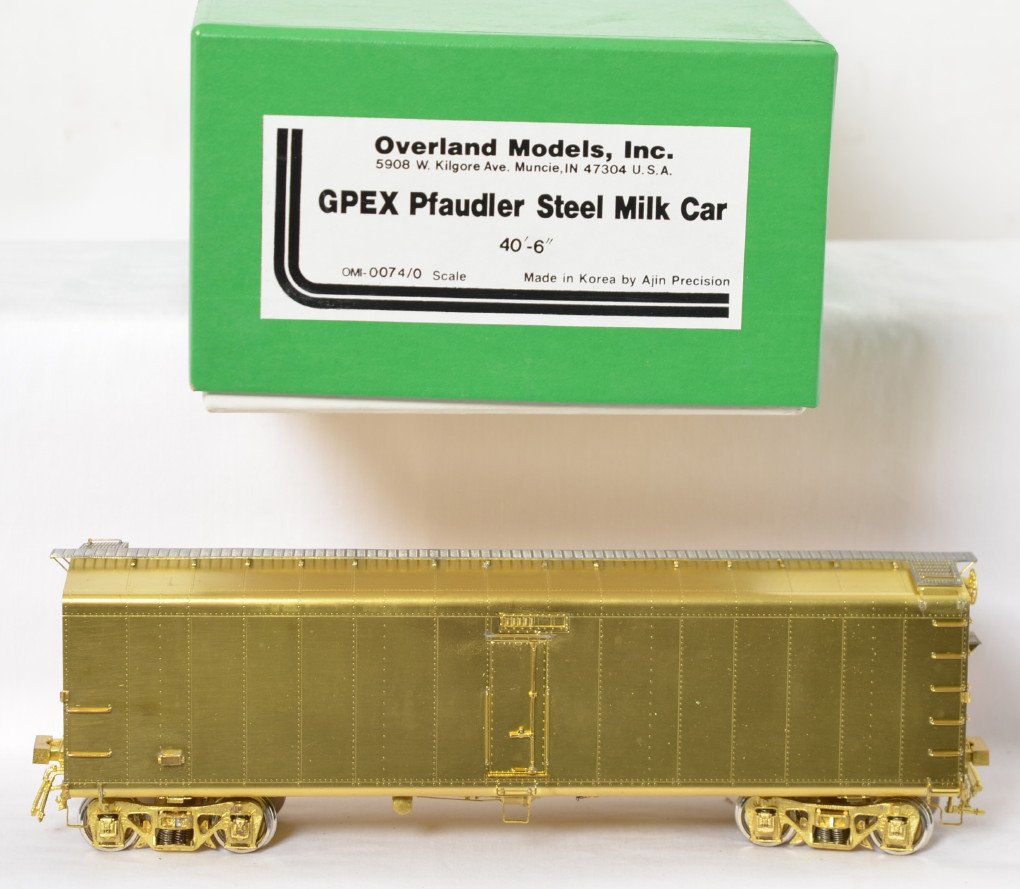 Overland models GPEX Pfaudler milk car: Overland Models modern O scale two rail brass OMI-0074 GPEX Pflauder steel milk car in OB. Car is C7-8 with some light speckles of tarnish forming on the roof.