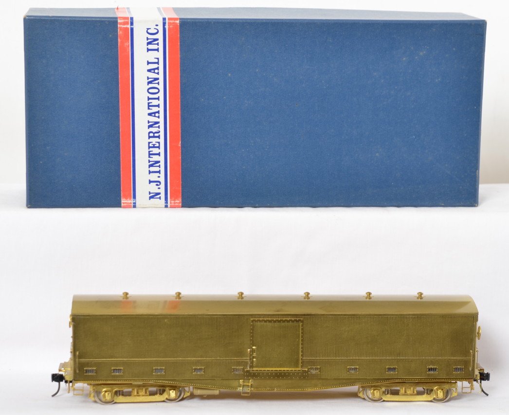 NJ International brass New York Central milk reefer: NJ International modern O scale two rail brass New York Central milk reefer in OB. Catalog number is 675-OS. Car is C8 with some light marks on the roof that look like water spots. No major tarnish.