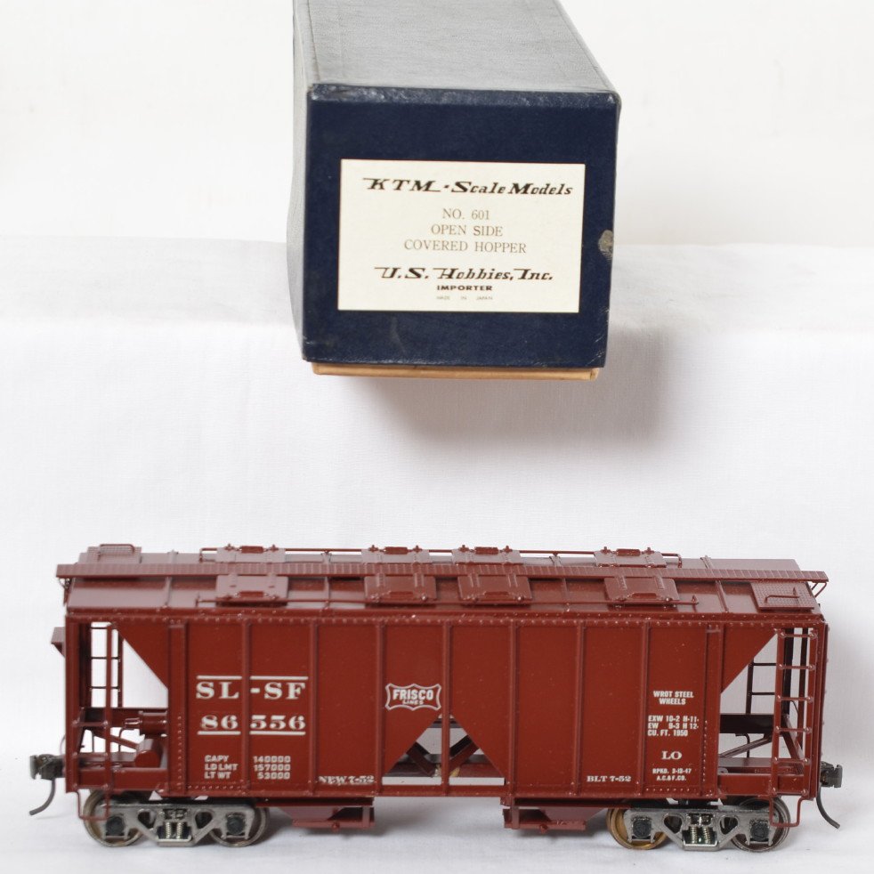KTM Frisco 601 open side covered hopper: KTM modern O scale two rail brass 601 Frisco brass open side hopper in OB. Car is C8 with clean paint and decals. OB has some light wear.