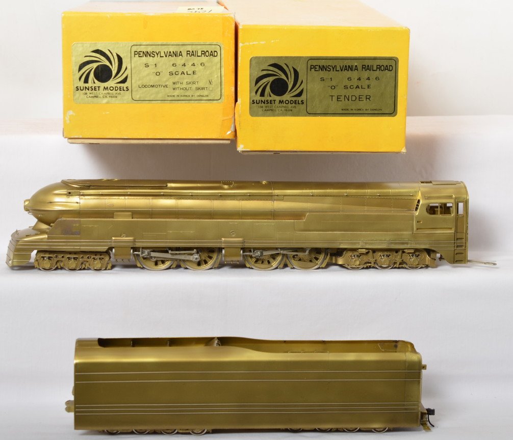 Sunset Pennsylvania S-1 6-4-4-6 steam locomotive: Sunset Model modern O scale two rail brass Pennsylvania S-1 6-4-4-6 unpainted steam locomotive in OB. Loco is C7-8 with some small spots of darkening, but no major tarnish marks. OBs have some light w