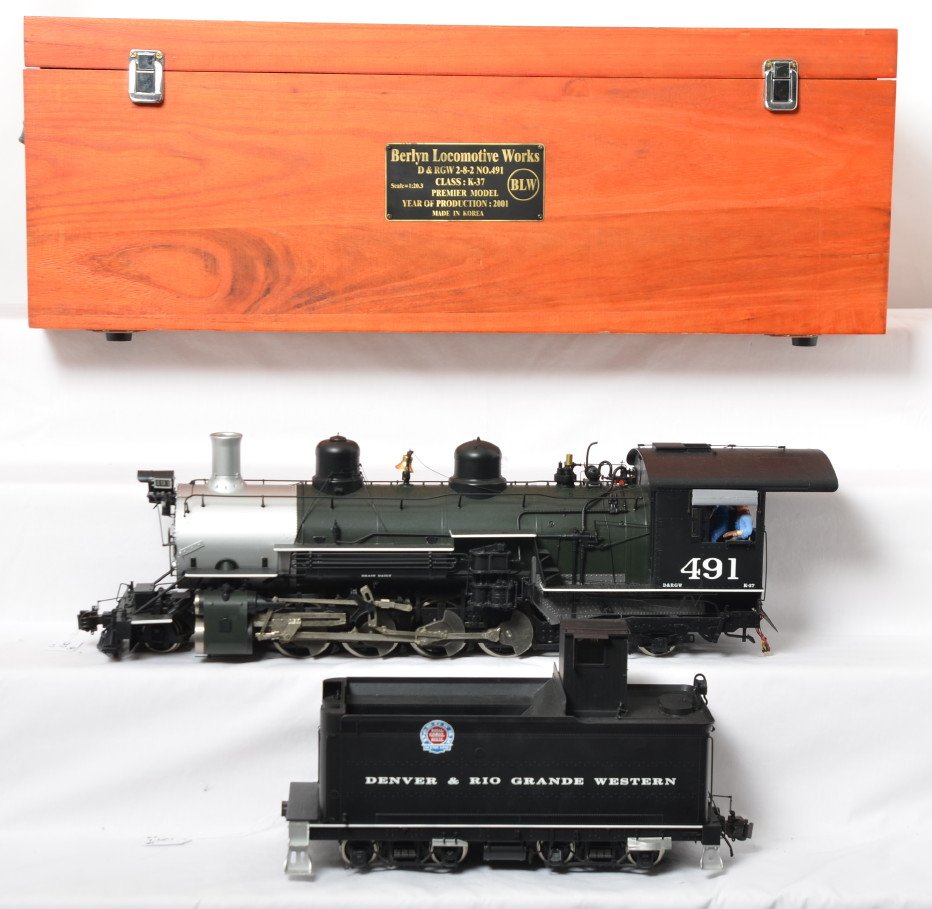 Berlyn Locomotive Works D&RGW K-37 2-8-2 No. 491 in OB: Modern era Berlyn Locomotive Works G scale/1 gauge brass D&RGW K-37 2-8-2 steam locomotive and tender number 491 in tricolor. Loco looks C8-9 with run time. Tender appears to have sound system. Wooden