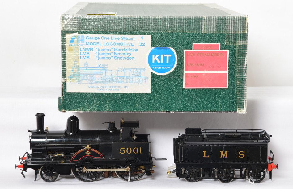 Aster LMS Jumbo Snowdon 2-4-0 live steam: Aster gauge one live steam locomotive in OB. Loco is LMS –Jumbo” Snowdon. Loco is complete and not in kit form. Serial number is 024 060. Loco looks unrun C8-9 with some very light wheel marks, ha
