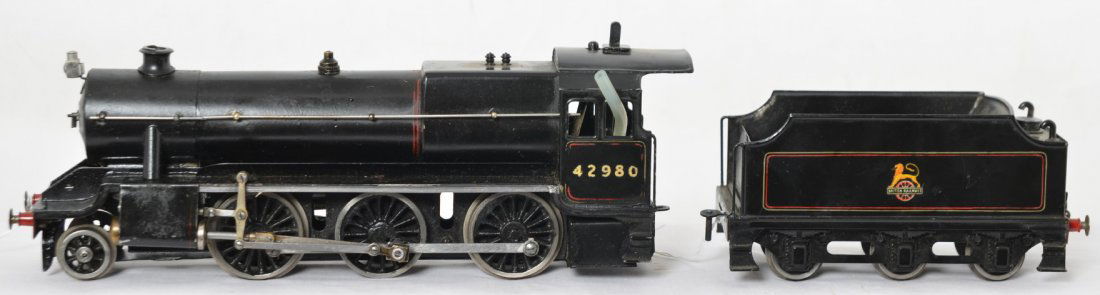 Bassett Lowke 2-6-0 steam locomotive: Bassett Lowke 2-6-0 live steam O gauge / O scale steam locomotive. Loco has cab number 42980 and British Railways logo on the tender. C7 with run time with some repainting on the cab roof and other to