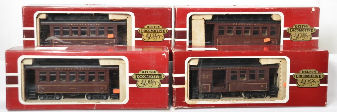 Delton Locomotive Works Pennsylvania passengers in OB: Modern era Delton Locomotive Works G scale/gauge 1 Pennsylvania passenger cars in OB, three 3210 32 coaches and one 3211 36 combination car. Trains look C8 area with light run time. Boxes show a littl