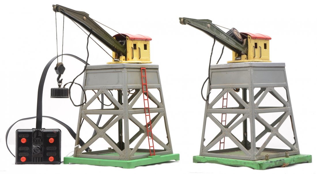 Lionel Prewar 2-165 Magnetic Cranes: Lionel prewar O gauge two 165 magnetic cranes one with controller that has been rewired. The other crane is missing the hook, controller and wiring. Both cranes have gray structures. The crane without
