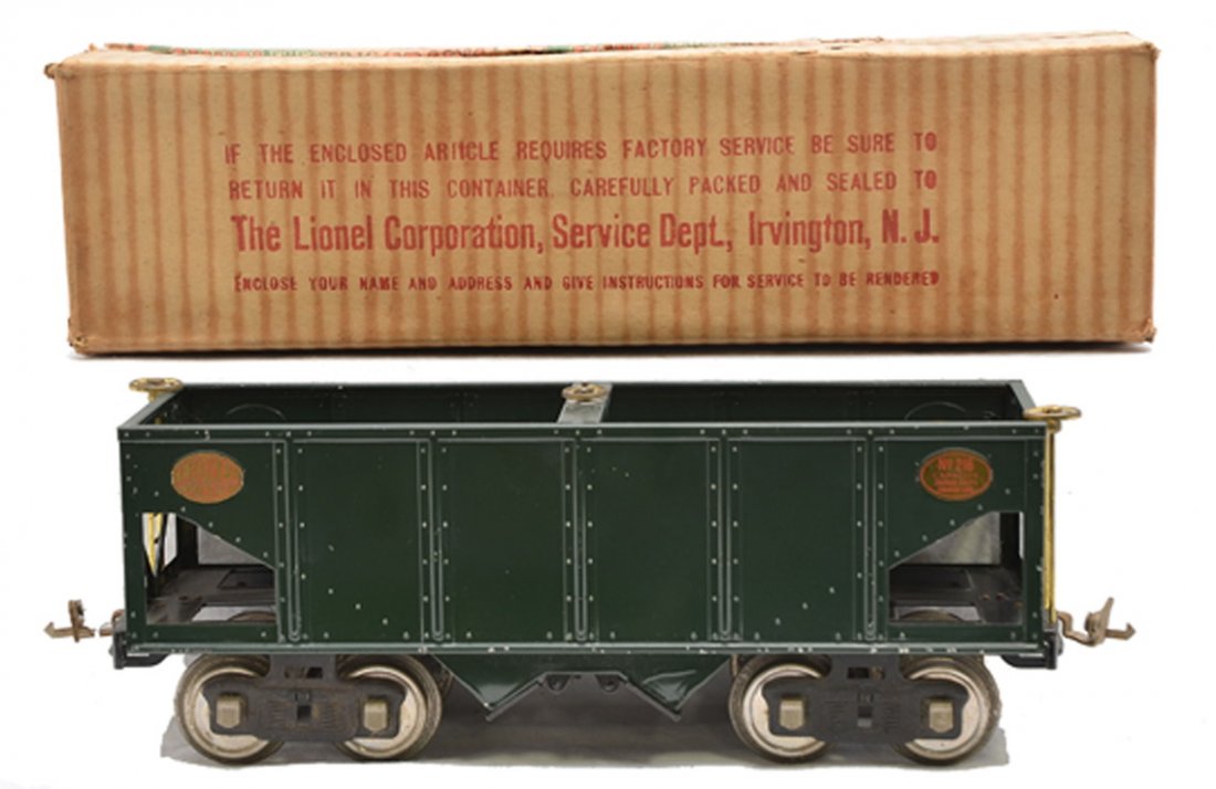 Lionel 216 Dark Green Hopper w/Brass Trim OB: Lionel prewar standard gauge 216 dark green hopper with brass trim and nickel journals in OB. This is the version with brass plates and red lettering. The paint is clean, however car has minor nicks. 