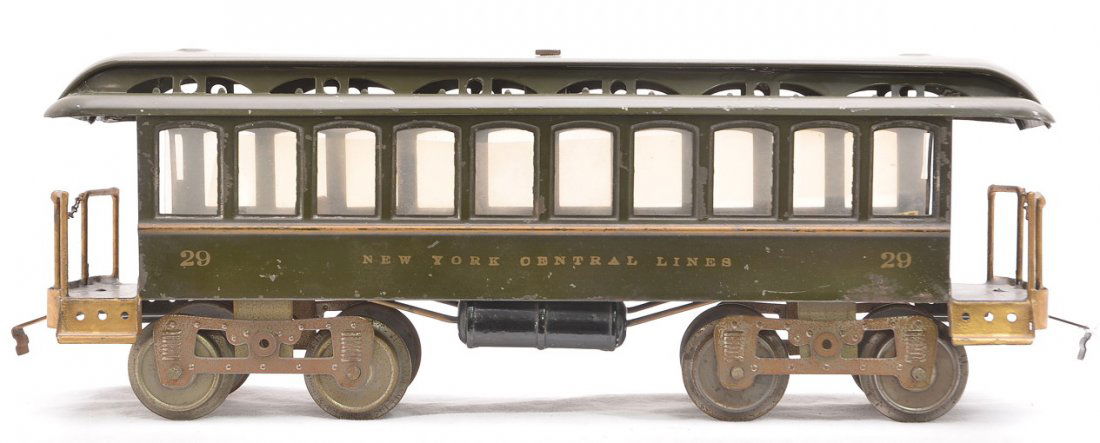 Lionel Std. Ga. 29 Dk. Olive Green Day Coach: Lionel prewar standard gauge no. 29 dark olive green day coach with ten windows and removable roof. The car is stamped New York Central Lines under the windows and Lionel Mfg. Co. N.Y. embossed on the
