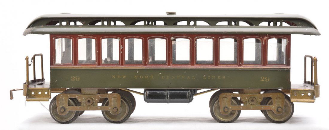 Lionel Std. Ga. 29 Dk. Olive Gr./Maroon Day Coach: Desirable Lionel prewar standard gauge 29 dark olive green day coach with ten windows and removable roof. This is the harder to find version with a maroon band through the windows and maroon interior.