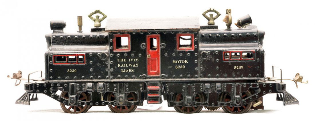 Ives Prewar 1 Gauge 3239 NYC Electric Locomotive: Ives prewar 1 gauge 3239 NYC cast iron electric locomotive silver lettered THE IVES RAILWAY LINES. The loco has a black body and frame with red painted doors, window frames, steps and ventilators. The