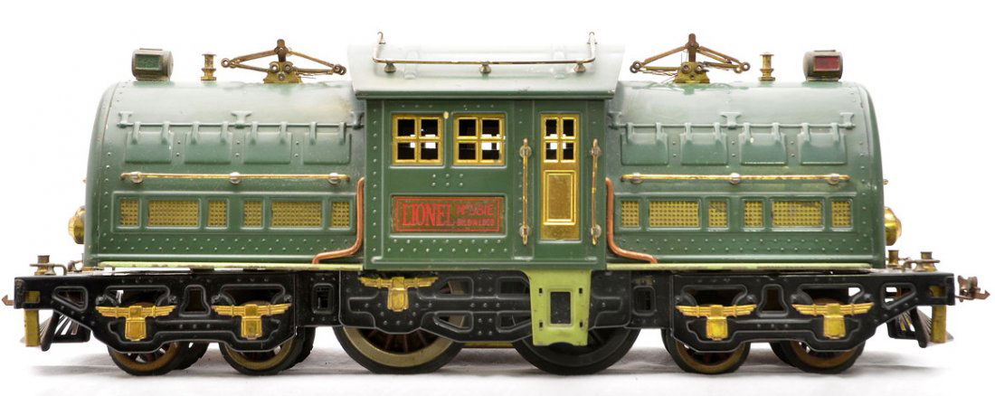 Lionel 381E State Green Electric Loco: Lionel prewar standard gauge 381E State green 4-4-4 electric loco with an apple green sub frame, red lettered brass plates and brass trim. This loco was part of the State passenger set. The brass ladd
