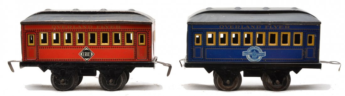 Hafner OF Erie and B&O Litho Passenger Cars: Hafner Overland Flyer prewar O gauge four-wheel 5 1/2 inch lithographed passenger cars with black roofs and frames; red coach with OVERLAND FLYER above the windows and an Erie herald below the windows