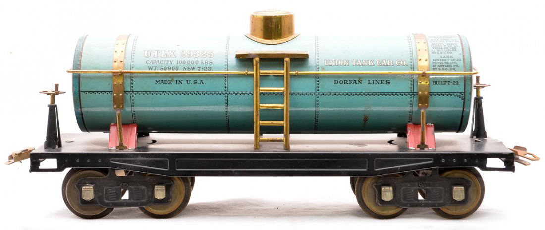 Dorfan 804 Blue Litho Union Tank no. 29325: Dorfan prewar wide gauge 804 blue lithographed Union Tank car numbered 29325 with red tank cradles and brass trim. The tank is equipped with Lionel 200 series trucks. Car is C6-7.