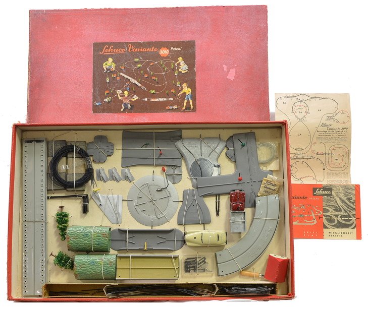 Schuco 3010R Variante Deluxe Play Set MINT OB: Schuco no. 3010R Variante Deluxe Play Set marked U.S. Zone Germany in original red box. The set contains a clockwork 3042 truck, 3041 auto, track, accessories and paperwork. The play set is all intact