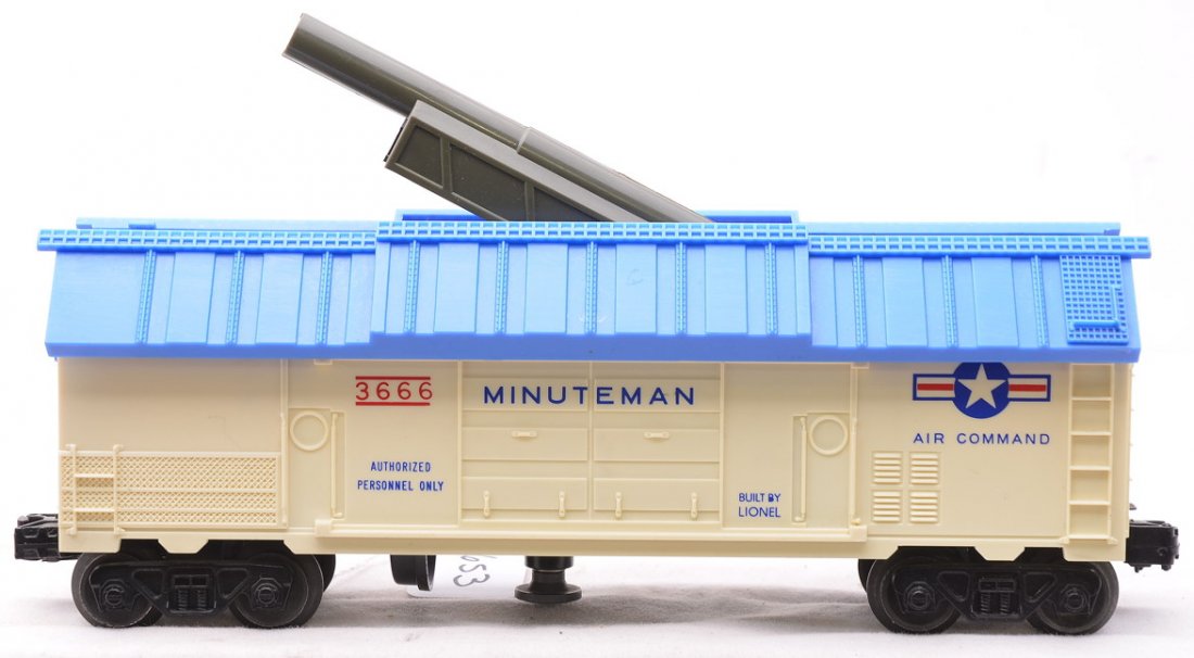 Lionel 3666-25 Minuteman Cannon Car w/Cannon: Lionel postwar 3666-25 Minuteman cannon car with olive cannon. This Minuteman cannon car came with the Sears uncataloged Space and Military set no. 19326 (9820), circa 1964. The car body has slight ye