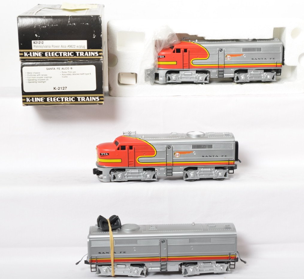 K Line Alco A-B-A upgraded with TMCC and Railsounds: K Line modern O gauge Santa Fe Alco A-A and B units. OB for A unit is incorrect. B unit is K-2127. Locos have been upgraded with TMCC, Railsounds, Electrocouplers. Trains are C8 with run time.