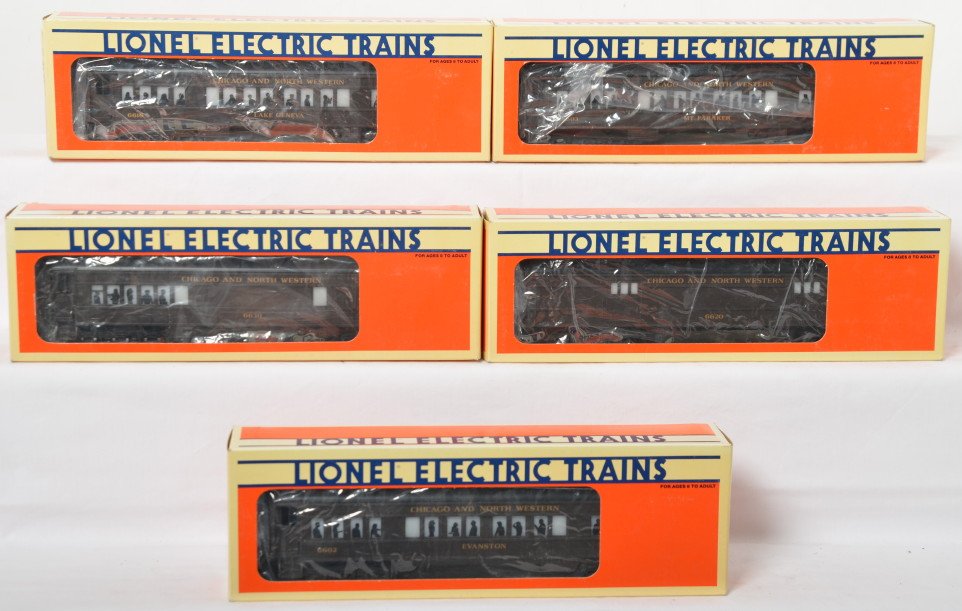 Lionel C&NW 5 car pass set 16050-4: Lionel modern O gauge passenger cars. Chicago and Northwestern cars include 16050 baggage, 16051 combo, 16052 Pullman, 16053 Pullman, and 16054 observation. Cars are C8 with run time.