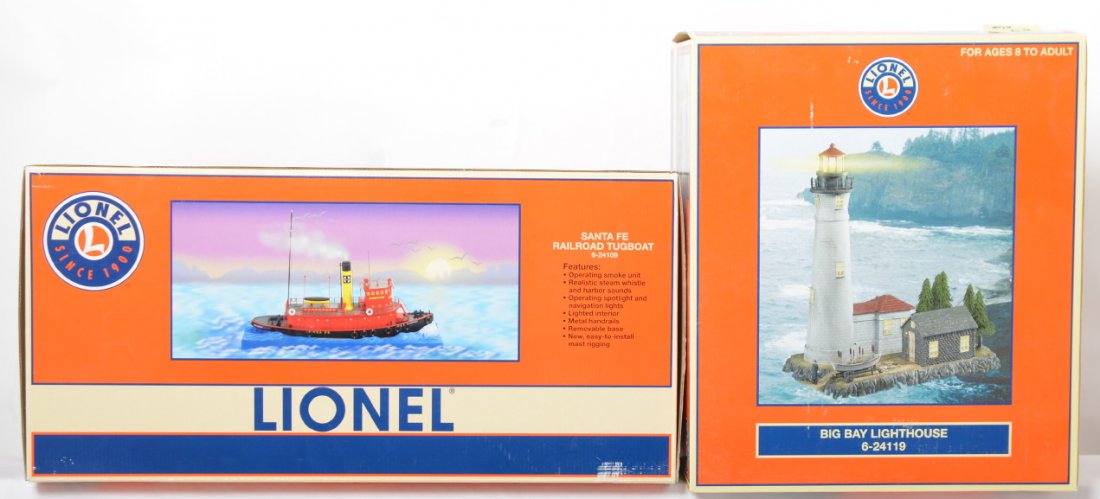 Lionel Santa Fe tugboat and Big Bay lighthouse: Lionel modern O gauge accessories in OBs. Includes 24109 Santa Fe Tugboat and 24119 Big Bay lighthouse. Items are open but appear unused C9 area. OBs have some light dust.