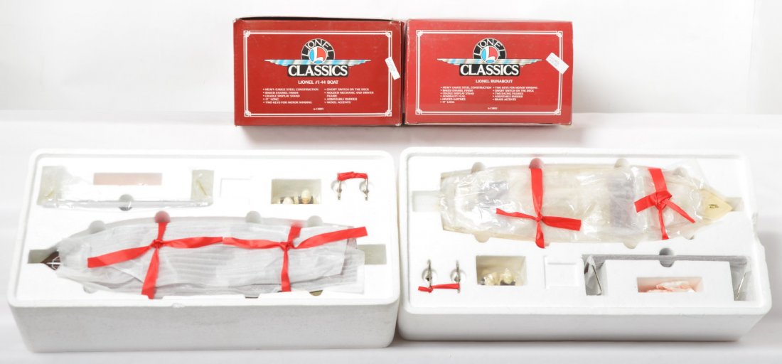 Lionel Classics tinplate 1-44 and runabout boats: Lionel Classics modern standard gauge tinplate boats in OBs. Includes 18305 1-44 boat and 13802 runabout. Both boats are C9-10 factory wrapped. Both OBs have some light wear.